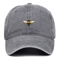 Close-up of vintage washed cotton baseball cap featuring detailed bee embroidery - Gray