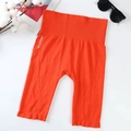 High-waisted bright orange seamless sports shorts with wide ribbed waistband support - One Size / Bottoms / Orange