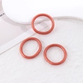 Tre braccialetti elastici glitter arancione e bronzo con finitura metallica su bianco - Set di 3 elastici per capelli arancioni scintillanti (50002 (Anello))