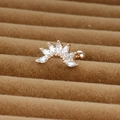 Macro detail of rose gold fan-shaped stud featuring marquise-cut zircon crown and screw ball back - Fan Shape / Rose Gold