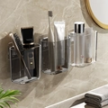 Wall-mounted transparent acrylic bathroom organizer with 3 drainage cups on marble wall - Family of 3-2 Grey+1 Clear