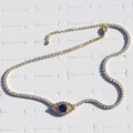 Close-up of gold choker with clear crystals and purple zircon evil eye pendant detail - Blue (Customizable)