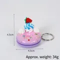 Porte-clés donut violet avec glaçage rose, crème et fraise, taille 4,5 cm - Décoration beignet perle artificielle (avec porte-clés) / 4.50cm / Violet