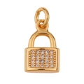 Macro-opname van een gouden slot hanger ingelegd met heldere zirkonia op witte achtergrond - Slotvorm