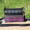 Detailed close-up of ethnic cross-stitch embroidery on a black three-layer crossbody bag - Style 6