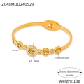 Detail showing the Tree of Life titanium steel bracelet with diameter and weight specs - Gold