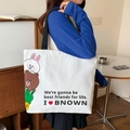 White canvas tote bag featuring cute cartoon animals and black shoulder straps - Animal Stack - White