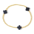 Bracciale elastico con perline dorate e tre ciondoli a croce neri su sfondo bianco - Perline Oro-Croce Nera