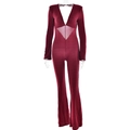 Detail view of red long sleeve bodysuit with deep V-neck and cut-out waist design - S / Red