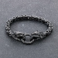 Detail of black Byzantine chain bracelet with dual lion head clasps on dark textured background - Black (KB108240-Z)