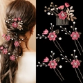 Close-up of pink floral hair accessories with gold leaves and bridal pearls detail - Rose Red 5-Piece Set