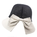 Detail of breathable mesh crown and large bow on a wide-brim bicolor sun hat - Adjustable / Off White