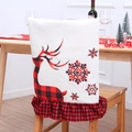 Christmas chair cover featuring red and black plaid reindeer and snowflake prints - Reindeer and Snowflakes
