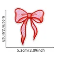 Detailed dimensions of blue bow tie embroidery patch with precise measurement labels - Style 2 (Pink Plaid Bow)
