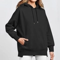 Detail shot of black oversized hoodie featuring drawstring hood and front pocket - S / Black