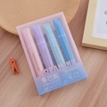 Set of 4 colorful highlighters in romantic starry shades on a wooden desk setup - Romantic Galaxy Series (4 Pcs)
