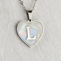 Elegant heart pendant necklace featuring mother of pearl inlay and silver letter L charm - Letter L / Silver