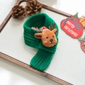 Detail of green knit Christmas pet scarf with reindeer plush decor and festive items - S / Green