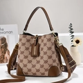 Retro monogram bucket bag in brown leather and jacquard canvas with woven strap - Brown