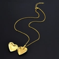 Golden heart-shaped locket necklace in open position showing interior photo compartment - Leaf Pattern Heart / 50+5cm / Gold
