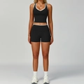 Set sportivo nero da donna con bordi bianchi a contrasto, top con scollo a V e pantaloncini - Taglia S / Top E Pantaloni / Nero Premium (Top+Pantaloncini)