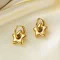 Elegant gold star drop earrings displayed on premium soft yellow silk fabric - Star Charm Gold Hoop Earrings (G3042)
