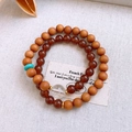 Stacked bracelet featuring brown wood beads and garnet stones with a white crystal bead - Wood Bead White Crystal Stackable Style (26#)