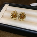 Detail of vintage gold-plated oval tiger eye stud earrings on beige silk cushion - 10# Square Gold Edge Cat Eye Style (10# Silver Earring Post - Gold - Coffee)