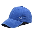Detailed side view of navy washed cotton baseball cap with white RK embroidery logo - Adjustable / Sapphire Blue