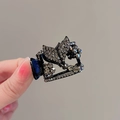 Pince à cheveux noire élégante avec strass brillants pour coiffure en queue de cheval - Style Strass en Queue de Poisson / Métal canon