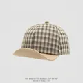 Primer plano de gorra de algodón a cuadros para niños con textura y costuras detalladas - 48cm (5-18 Meses) / Cuadros Verdes (Ala Beige)