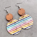 Close-up detail of geometric cork earrings with hand-painted colorful stripes and dots - Colorful Fine Stripes