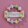 Colorful ceramic heart beads bracelet with Thank You card on a soft pink background - Color Heart Round Beads (1586-16)