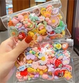 Set de gomas de pelo infantiles con dijes de dibujos en bolsa transparente con cierre - Embalaje de bolsa de margaritas de 20 piezas aleatorias