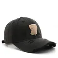 Distressed black baseball cap with number 7 patch and vintage frayed hole details - Black