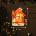 Christmas LED light house pendant with reindeer pattern hanging on a decorated tree - Christmas House
