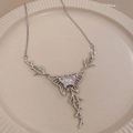 Silver butterfly branch pendant necklace with delicate chain on a beige display plate - Silver (Leaf Branch Style)