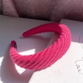 Fuchsia knitted thick headband for women with diagonal cable knit texture in warm winter style - Rose Red