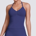 Detail of navy blue seamless sports bra with halter straps and pleated front texture - Dark Navy Blue