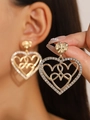 Elegant gold heart earrings with white crystals in a layered hollow drop design - Gold Pave (A-846)