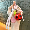 Portachiavi calcio con corda intrecciata rosa e ciondolo smiley per zaini - Rosa