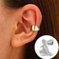 Sleek silver ear cuff featuring white zircon stones for non-pierced ears on a model - White K - Spiral Diamond Style (10684)