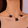 Gothic silver chain necklace with three black spider pendants on a female model - Triple Spider Gemstone Necklace (0428) / Matte Black