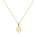 Detailed macro view of an oval gold pendant necklace featuring the letter Q and white enamel - Letter Q