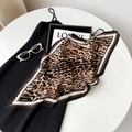 Detailed close-up of leopard print pleated satin scarf with textured accordion folds - 70cm / White Brim Leopard