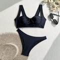Flat lay of black two-piece bikini with ribbed texture, straw hat and sunglasses - M / Black
