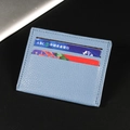 Slim blue lychee grain leather card holder featuring multiple slots for bank cards - Sky Blue
