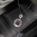 Elegant silver-plated necklace with oval pink gemstone pendant and white diamond halo - Pink Diamond Necklace Tz-32