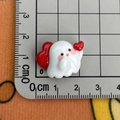 Detail showing white resin ghost charm with red heart and 2cm size measurement on a grid - Red Heart Ghost / Large
