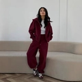 Women's burgundy tracksuit set featuring zip-up hoodie and high-waisted wide-leg sweatpants - S / Burgundy